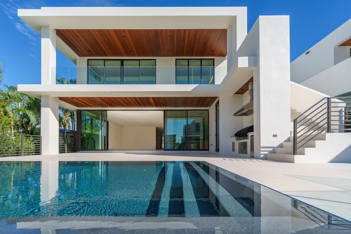 Still from a hospitality film: a contemporary villa with pool at dusk